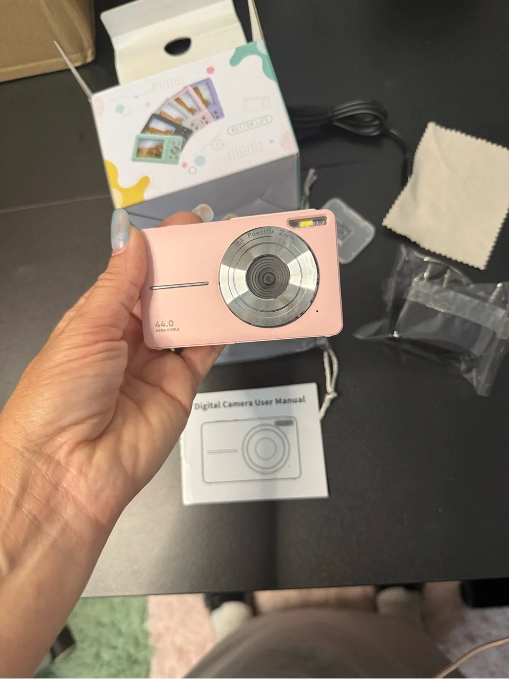 Pink Point-and-Shoot Digital Camera with Accessories